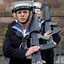 Parade guards from HMS Forward parade with guns