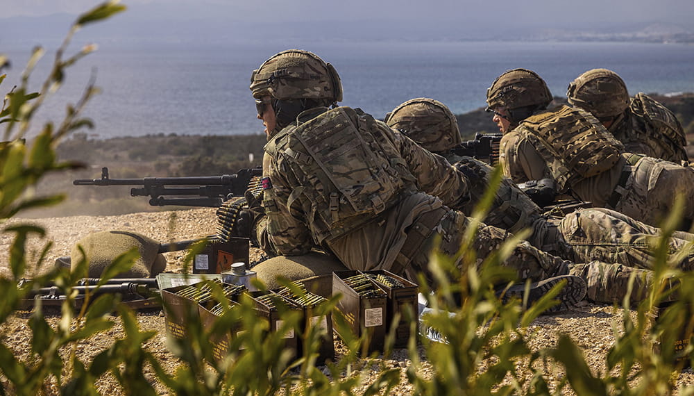 Royal Marines train with army in Cyprus. Royal Marines from 45 Commando fire support group with the general purpose machine gun.