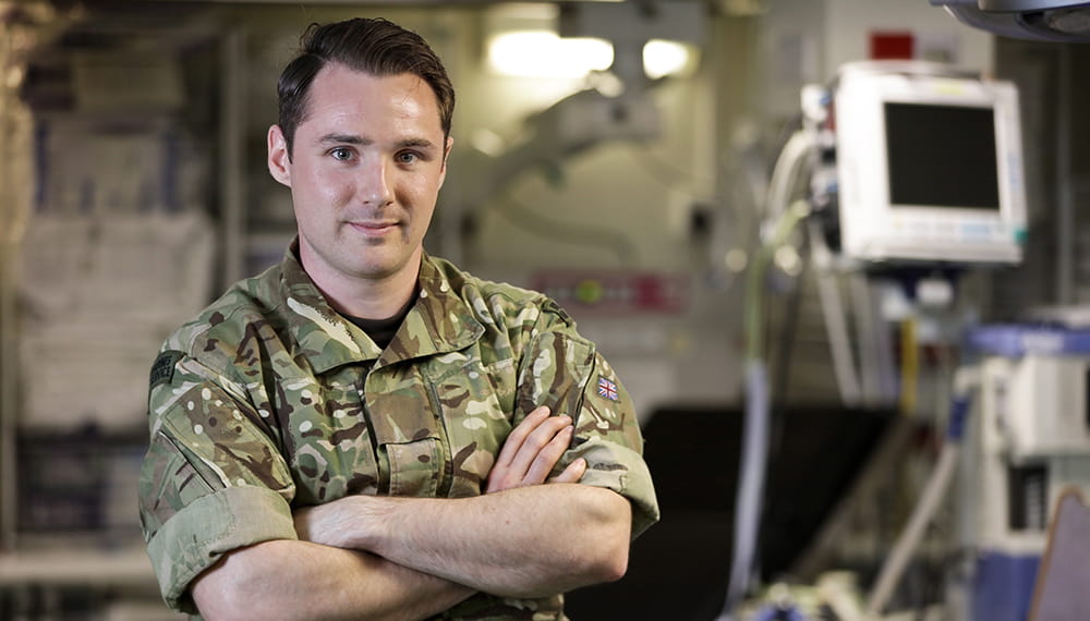 Royal Marine Band Member Musician Liam O'Neill who's secondary role is working in surgery as a runner and a spare pair of hands. 