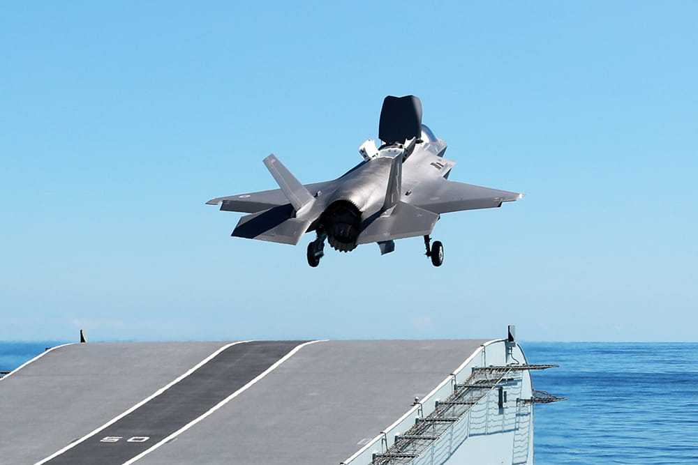F-35 Lightning jet takes off using an aircraft carriers ramp