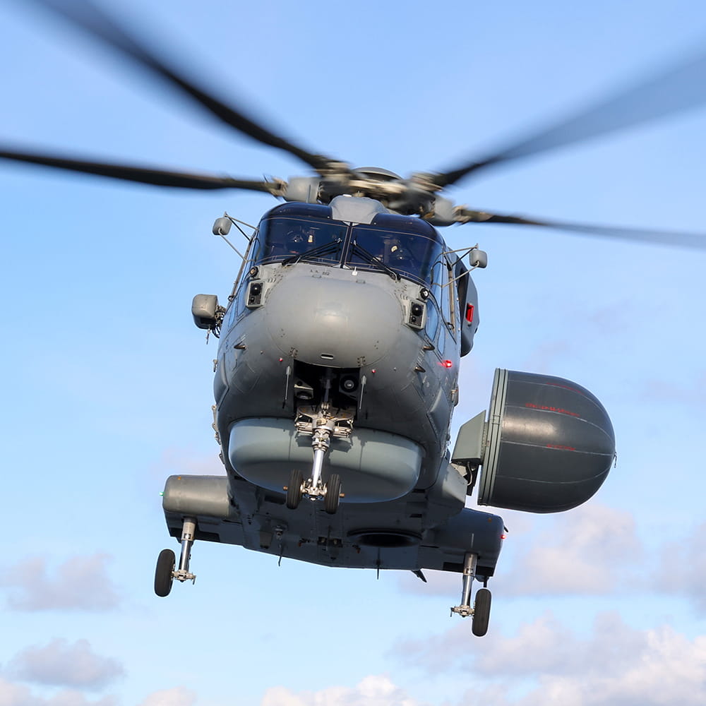 Royal Navy Merlin helicopter flies in for landing