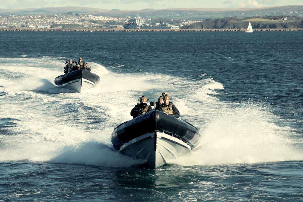 42 Commando speeding towards camera in a Pac 24 boat