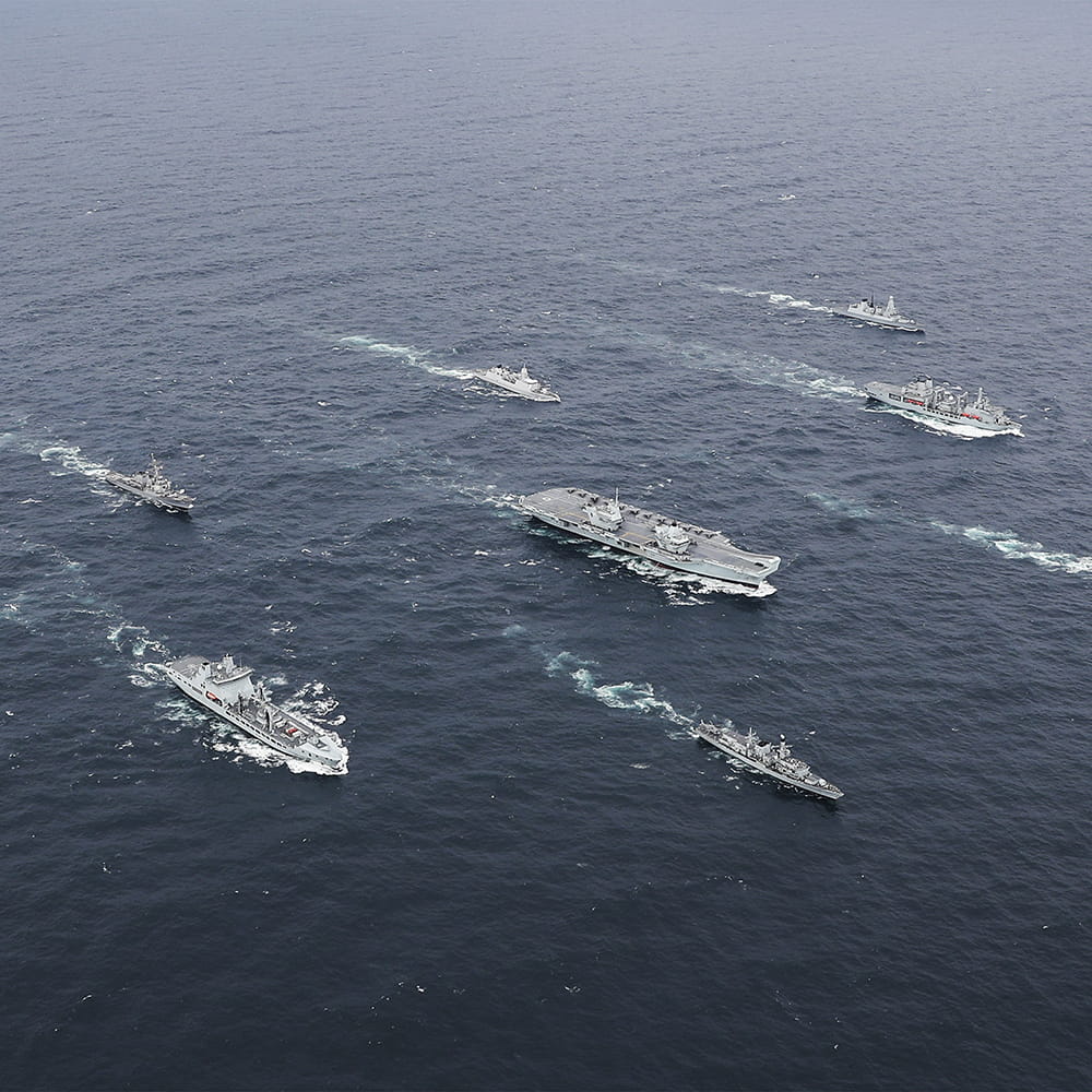 A flotilla of Royal Navy frigates and destroyers at sea