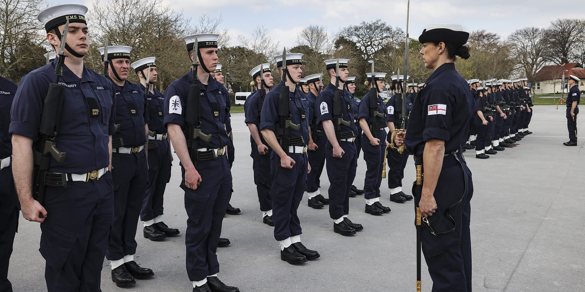 Sailors carry out drill practice on HMS Excellent parade ground