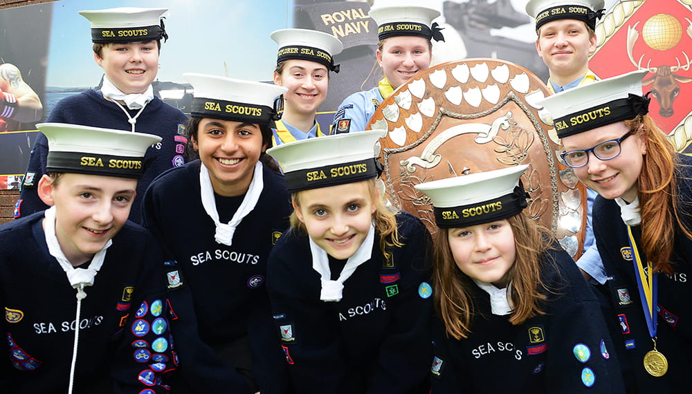 Nine Royal Navy cadets facing camera