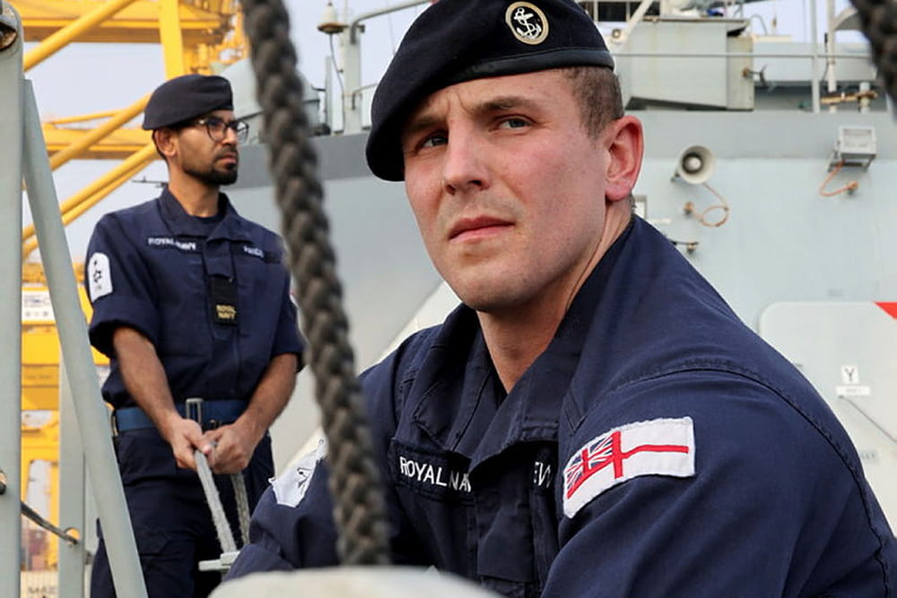 Royal Navy sailors at work on the deck of a Royal Navy vessel