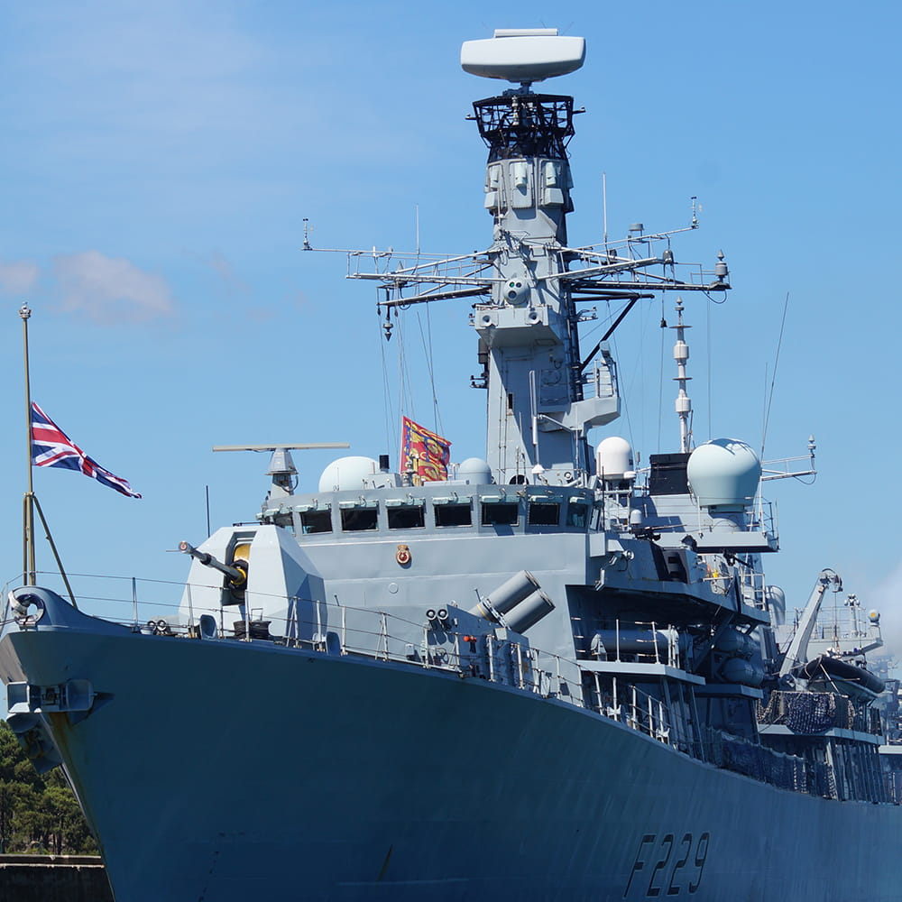 Royal Navy Ship the HMS Lancaster flies the Union Jack